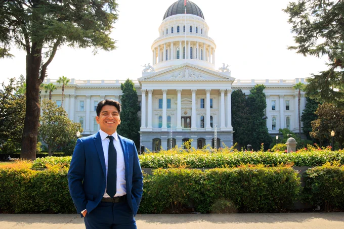 BCSH Fellow Abnner Olivares standing in front of the California State Capitol