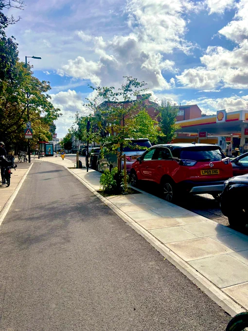 The cycle lane itself - with a kerb before cars