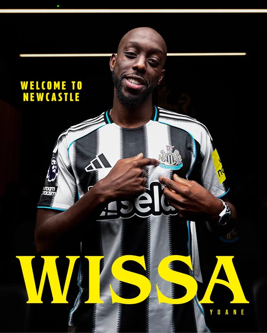 Yoane Wissa. Welcome to Newcastle United. Yoane Wissa points to the Newcastle United crest on the home shirt. 