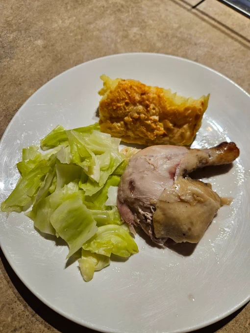 Dinner as described served on a round white plate.