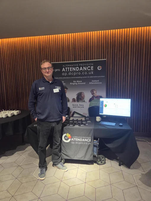 Mark stood in front of the DCPro Alternative Provision Attendance booth at Westminster Insight's Alternative Provision Conference in Newcastle.