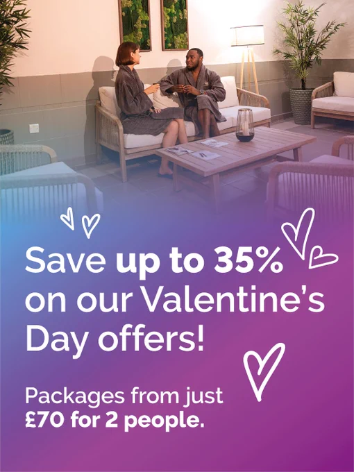 A graphic that says 'Save up to 35% on our Valentine's Day offers! Packages from just £70 for 2 people'.  There is a photo of a young man and woman sat in a spa relaxation room. The graphic has a purple/pink gradient overlay and has some white heart graphics.