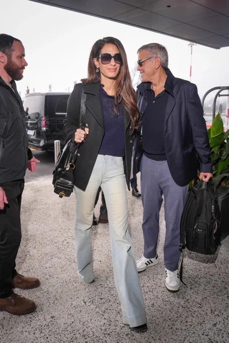 MILAN ITALY  FEBRUARY 08 George Clooney and Amal Clooney are seen arriving at the airport on February 08 2026 in Milan...