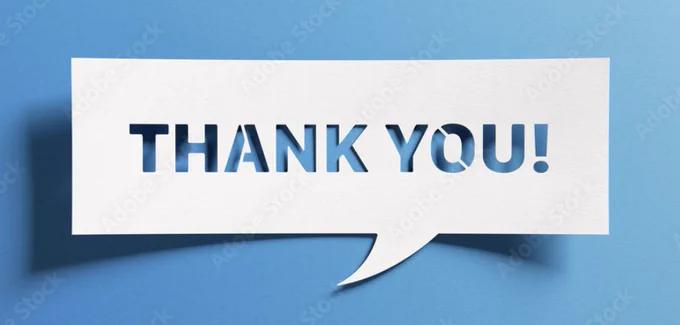 A cardboard cutout o fa speech bubble saying "Thank You!"