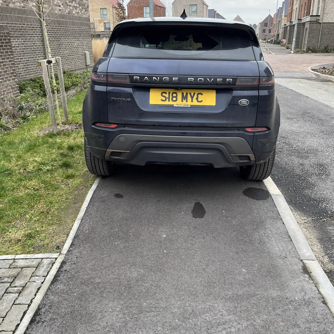 Land Rover S18 MYC blocking a footpath completely.
