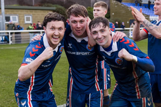 Bangor City 1876 celebrate victory against Caerau Ely. 