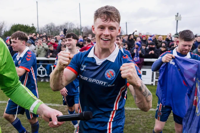 Bangor City 1876 celebrate victory against Caerau Ely. 