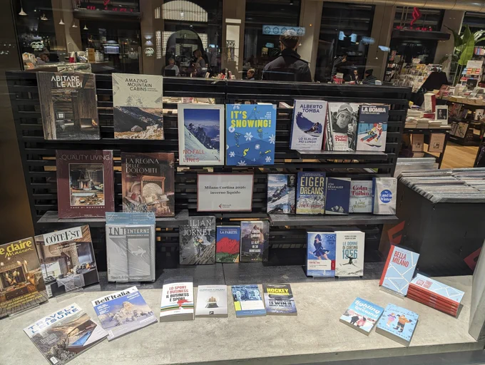 Olympic book display at La Feltrinelli, Milano. Michael Payne's Lo Sport E Businees Il Business E Sport is featured.