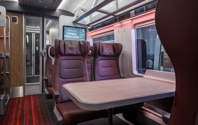 A photograph of a First Class coach on the Class 897 fleet featuring our Oxblood seats.