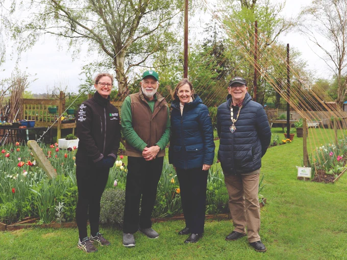 Sarah Squire, Chairman - Squire's Garden Centres (second from right), visits Badshot Lea Community Garden, recipients of a Squire's LWYL Award in 2024