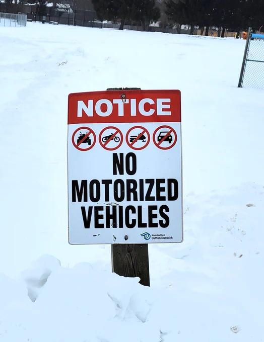 Photo of a "No Motorized Vehicles" sign.