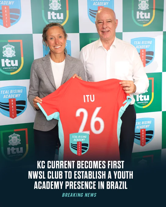 Photo of Angie Long and an Itu representative holding a jersey that says Itu 26 with copy over the photo that says "KC Current becomes first NWSL club to establish a youth academy presence in Brazil breaking news" 