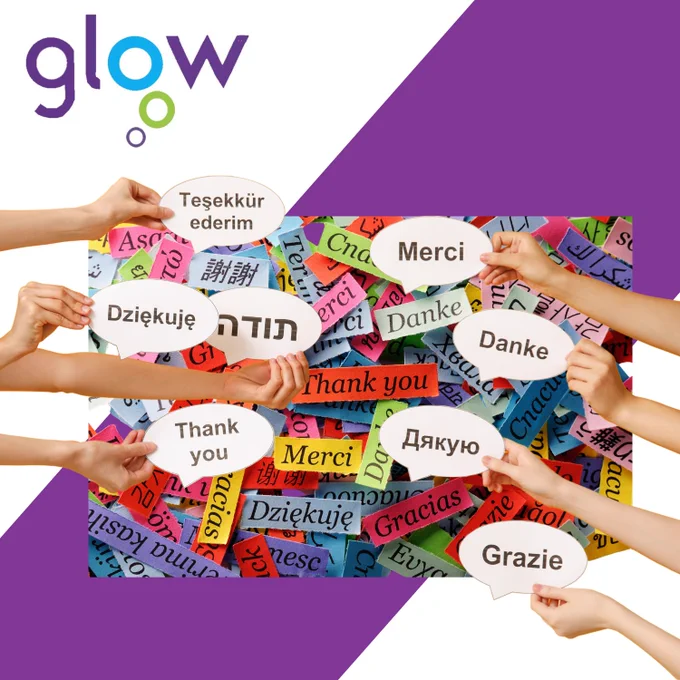 Hands holding speech bubbles with 'Thank you' in various languages over a colorful background of multilingual thank you notes.