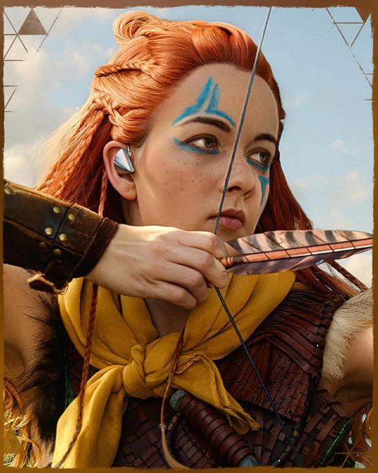 Close up shot of an Aloy cosplayer drawing an arrow.