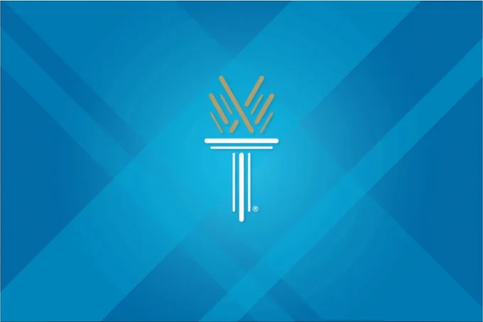 The Wake Tech torch, with gold and white lines is centered on a blue geometric background.