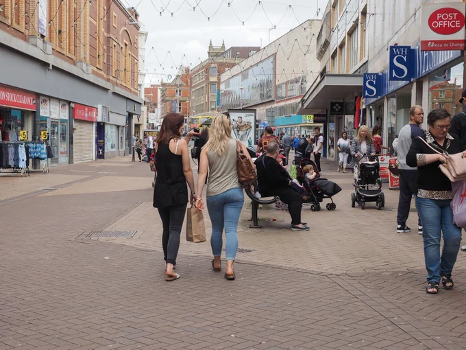 People walking in Blackpool high street