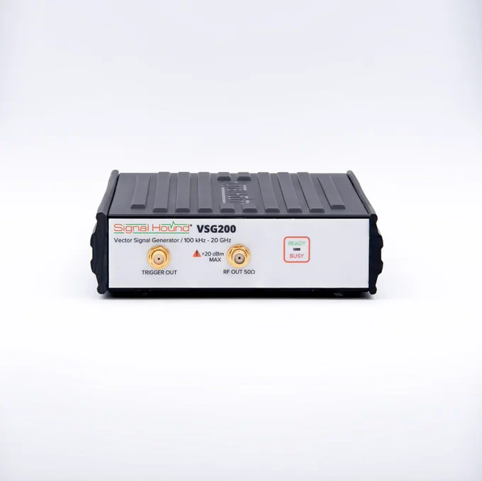 A Signal Hound VSG200 vector signal generator is displayed against a white background. The front panel features various controls, including a power button and connections labeled "Trigger Out" and "RF Out 50Ω." Indicator lights labeled "Ready" and "Busy" are visible.