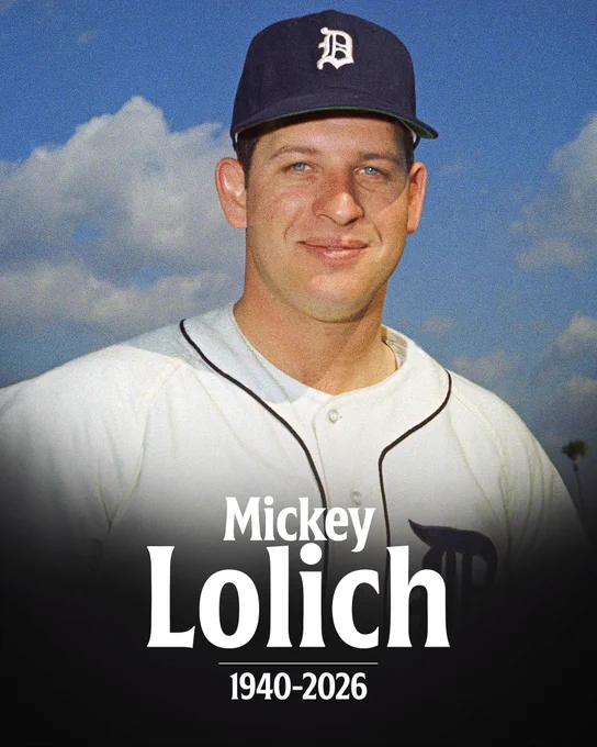 Mickey Lolich
1940-2026
A posed photograph of Mickey Lolich smiling and wearing a white Detroit Tigers uniform and black Tigers cap.