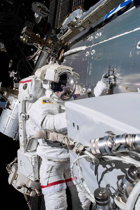 NASA astronaut Michael Hopkins is pictured installing the communications device – roughly the size of a cool box – outside ESA’s Columbus laboratory on 27 January 2021.
NASA astronaut Michael Hopkins is pictured installing the communications device – roughly the size of a cool box – outside ESA’s Columbus laboratory on 27 January 2021.