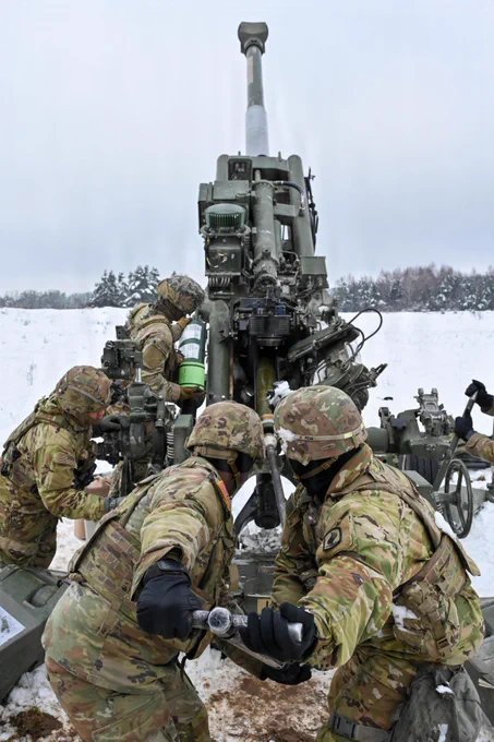 U.S. Paratroopers assigned to 4th Battalion, 319th Field Artillery Regiment, 173rd Airborne Brigade, prepare, load and fire an M777 Howitzer during Dynamic Front 26 at the Grafenwoehr Training Area, Grafenwoehr, Germany, Jan. 27, 2026. Dynamic Front is the practical application of the Eastern Flank Deterrence Line (EFDL) and enhances the U.S. and NATO's ability to coordinate lethal and non-lethal effects in a distributed battlefield. (U.S. Army photo by Pfc. Tomas J. Arce)