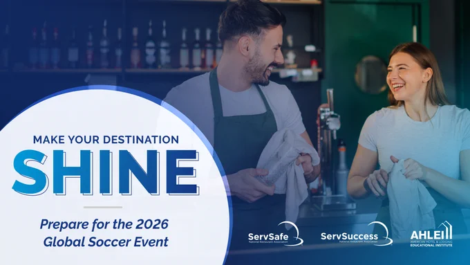 Promotional image for the 2026 Global Soccer Event featuring two smiling restaurant workers, one behind the bar and one interacting with them, with the text 'Make Your Destination SHINE' and logos for ServSafe, ServSuccess, and AHLEI.
