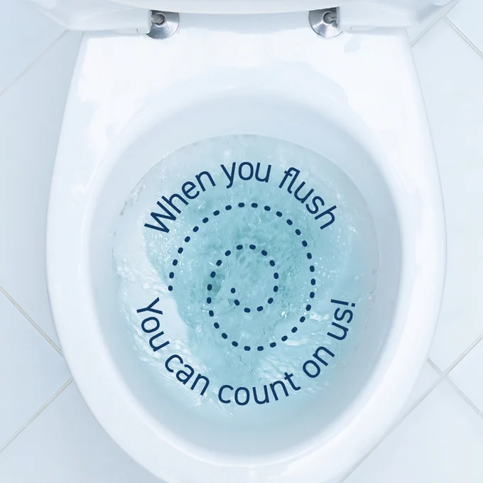 An image of a toilet flushing with the words saying, "when you flush You can count on us!" 