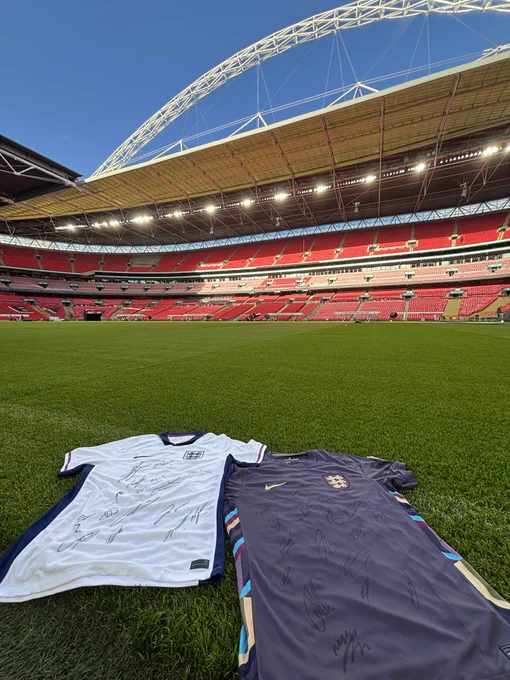 Signed England home and away shirt