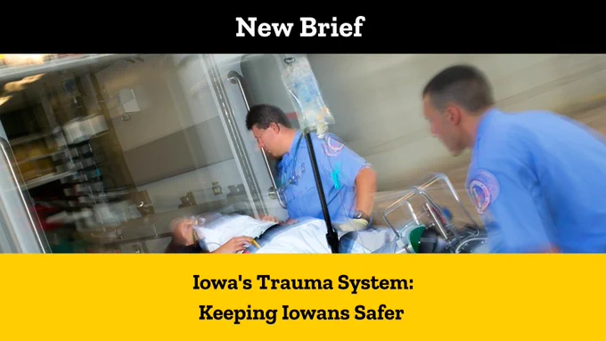 New brief. Iowa's Trauma System: Keeping Iowans Safer.

Two paramedics put an injured person into an ambulance