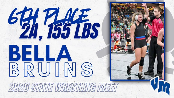 Wrestler Bella from Bruins team having her hand raised by referee after securing 6th place in 2A 155 lbs at 2026 State Wrestling Meet.