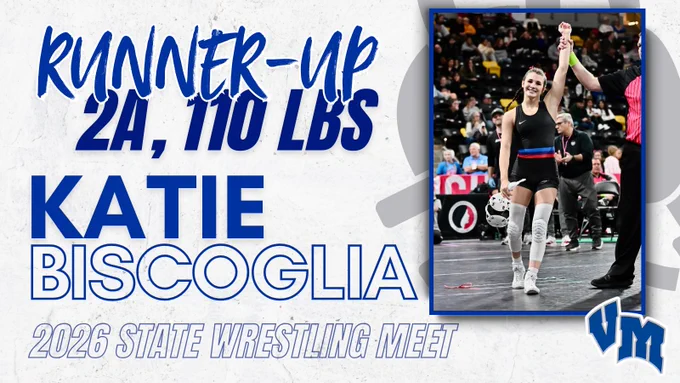 Wrestler Katie Biscoglia in black singlet has her arm raised as runner-up at 2026 2A 110 lbs state wrestling meet.