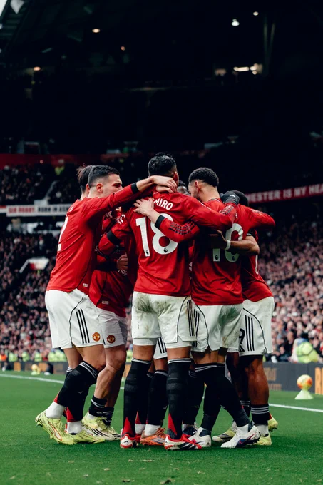 United celebrate as a team during the win against Tottenham.