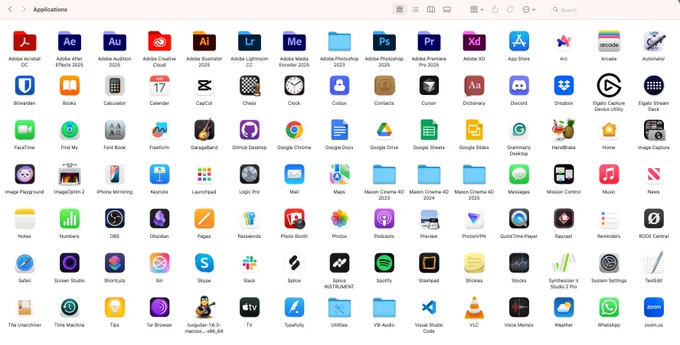 Mac desktop Applications view showing a dense grid of colorful app icons and folders arranged in rows and columns across the screen.