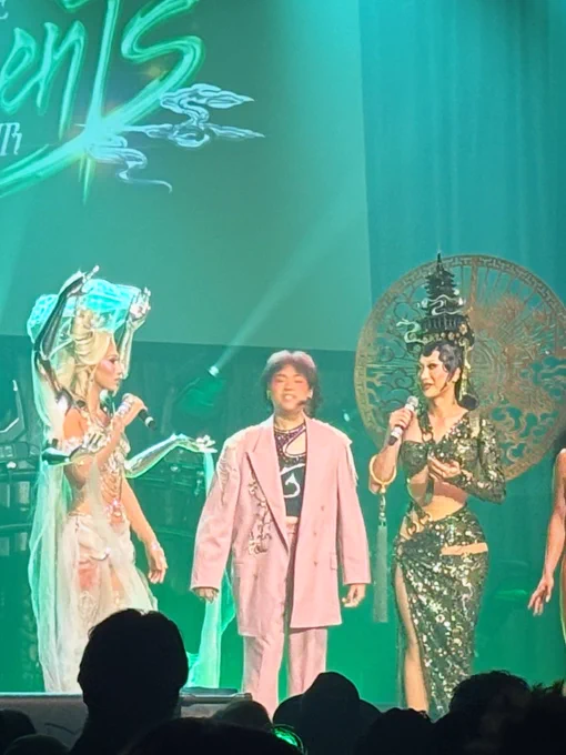 A photo of two lesbian mothers sending their child off to prom