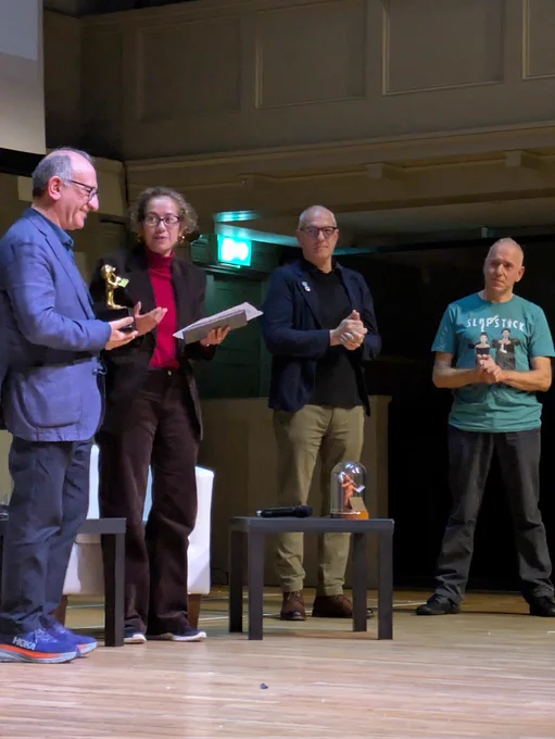 Armando Iannucci presented with the Golden Baz award, with Samira Ahmed, Bob Cryer and Chris Daniels