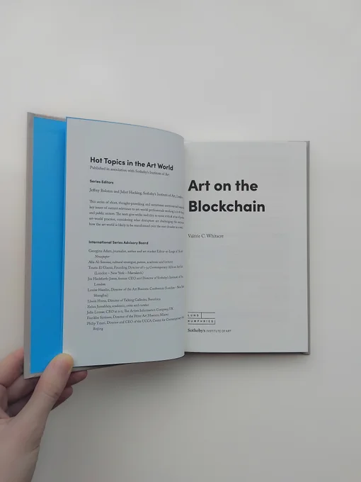 book held open to title page