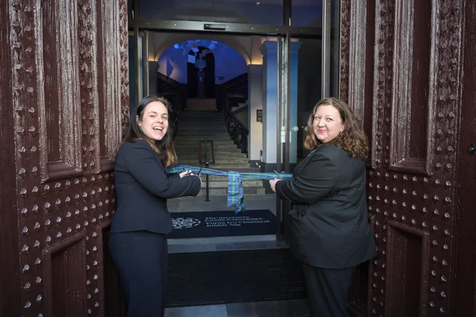 Deputy First Minister Kate Forbes and UK Government Minister Kirsty McNeil cutting a ribbon to mark the official opening of Inverness Castle.