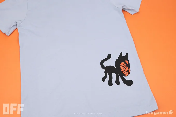 A lanky illustration of the Judge in black and red is printed on the bottom right of the back of the shirt. 