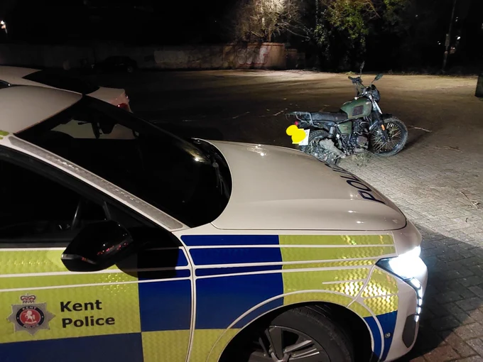 Police car and stolen motorcycle