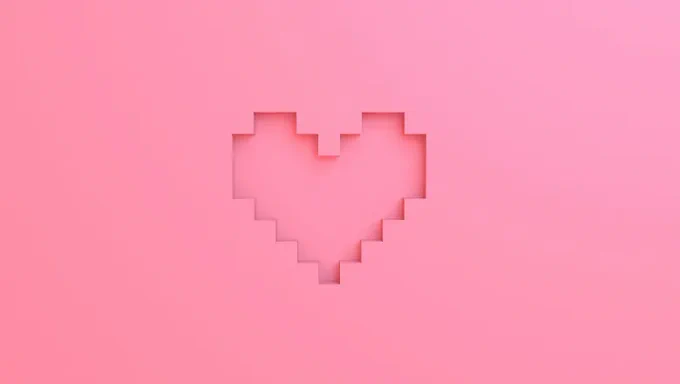 A cartoon illustration of a pink heart.