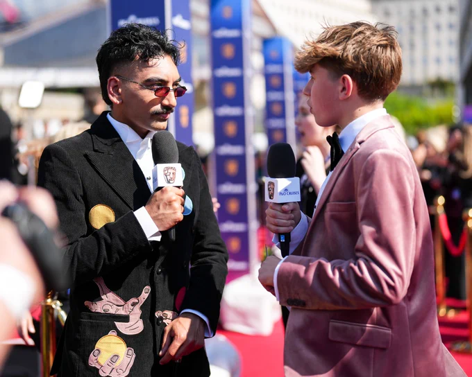 Young Presenter Tristan chats to Nabhaan Rizwan on the BAFTA TV Awards with P&O Cruises red carpet.