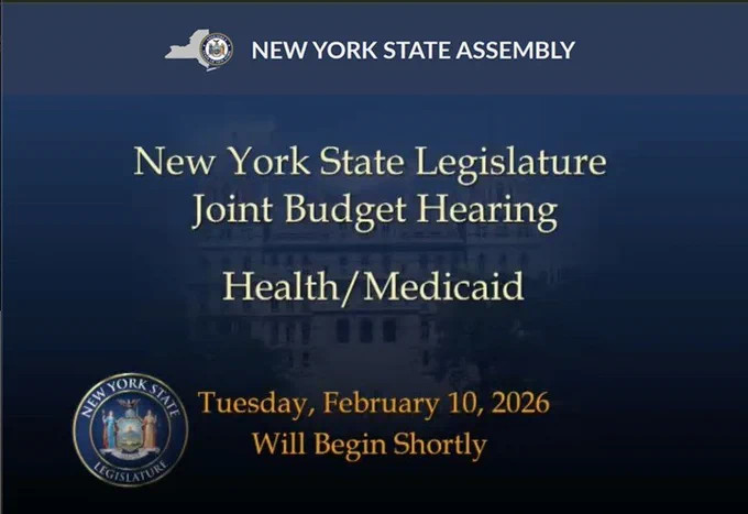 Screenshot of live feed. It says, New York State Assembly , New York state Legislature Joint Budget Hearing, Health/Medicaid. Tuesday, February 10, 2026, Will Begin Shortly