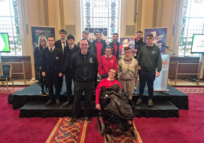NIHRC staff with students at the Commonwealth Games NI Schools Conference in Belfast City Hall.