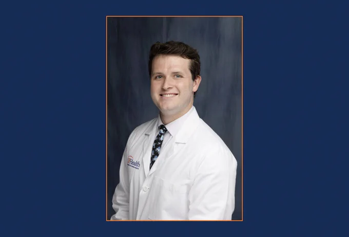 A headshot of Austin Coale, M.D.
