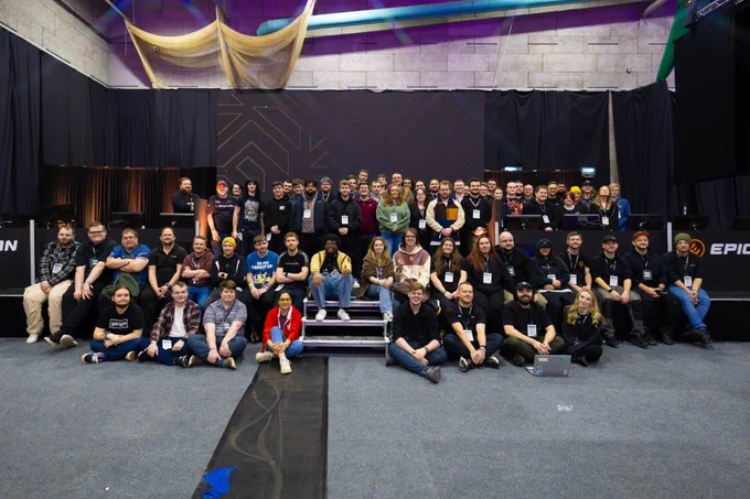 An image showing a large crew photograph on the main stage at the EPIC.LAN event. 