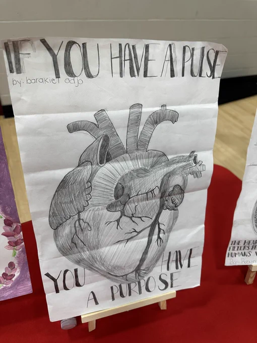 Poster of the heart with an anatomically detailed drawing.  Caption reads “if you have a pulse, you have a purpose.”