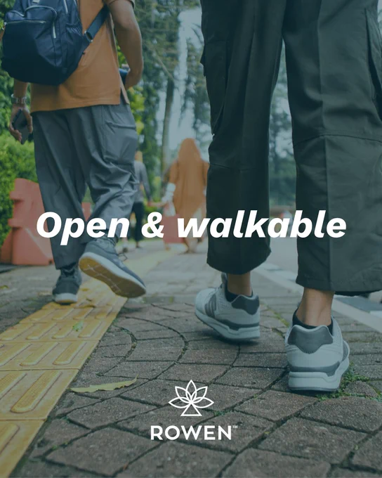 Two people walking on a path with a tactile paving strip. The text "Open & walkable" is written across the image. The logo and name "Rowen" are displayed at the bottom.