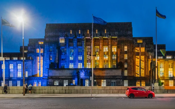 St Andrew’s House  lit up in blue and yellow on the 4th anniversary of Russia’s full-scale illegal invasion of Ukraine.
