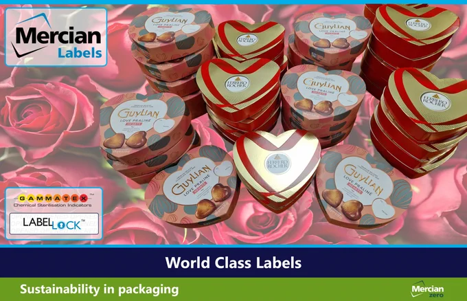 Stacks of heart-shaped chocolate gift boxes on a pink rose background. The boxes include red and gold heart tins and pink patterned “Love Praline Hearts” packages. Mercian Labels logo appears in the top left, with additional branding for GAMMATEX and LabelLock on the left side. A banner across the bottom reads “World Class Labels” and “Sustainability in packaging,” with a Mercian Zero logo in the lower right corner.