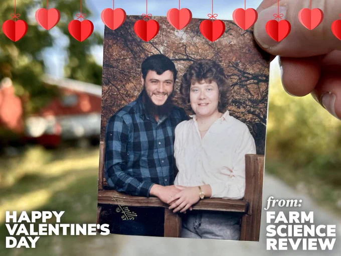 A hand holding a printed photo of Thomas Marshall and Jane Armstead in 1987, with Valentine's hearts around it, and the text, "Happy Valentine's Day from Farm Science Review."