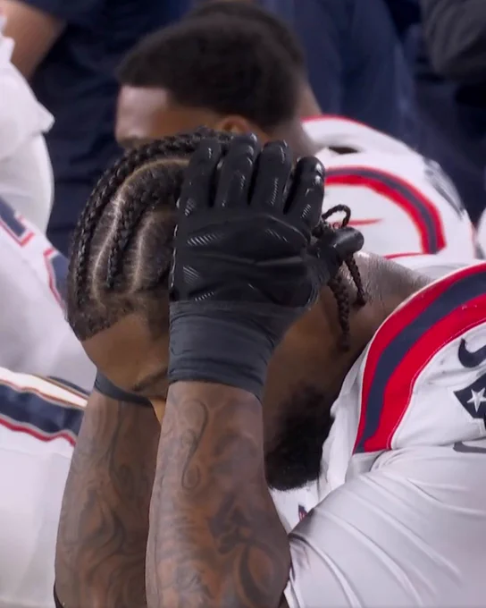 Stefon Diggs covering ears